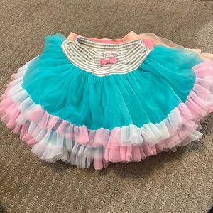 Bundle of 12 girls skirts/skorts and shorts